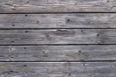 Dark wooden background texture. Old fence panels with natural patterns.