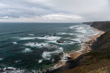 Beautiful rocky coastline and blue sea in Portugal
