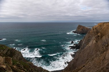 Beautiful rocky coastline and blue sea in Portugal