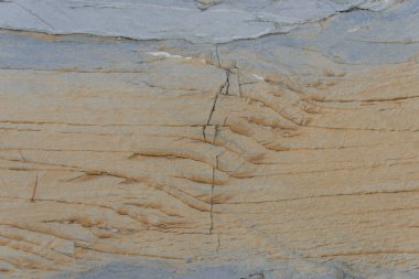 Doğu Grönland 'daki renkli kayalar kapanıyor. Kaya dokusu.