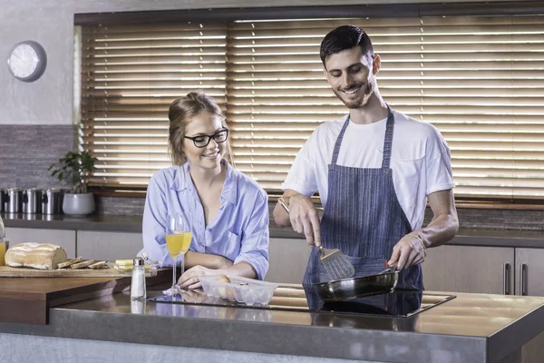 Breakfast preparation  kitchen cooking happy young couple — Stock Photo, Image