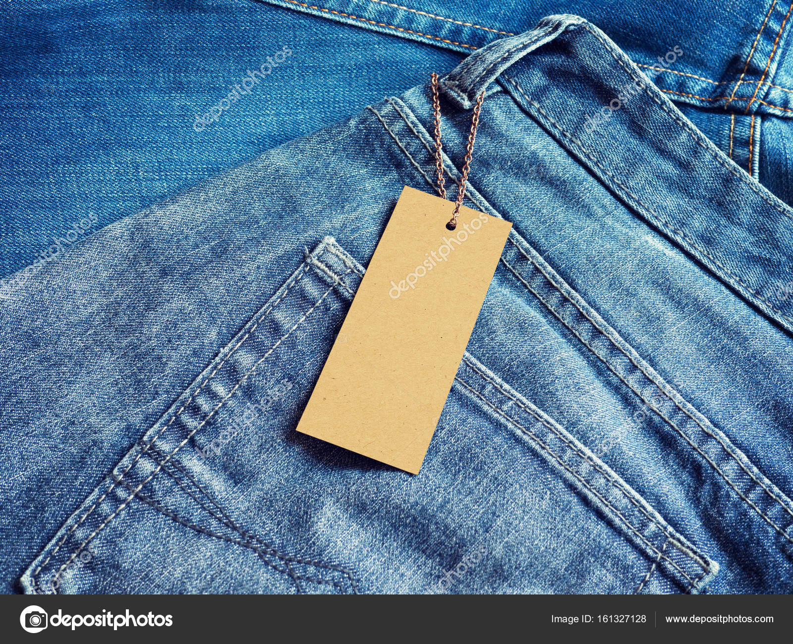 Download Label Blank Price Tag Mockup On Blue Jeans Stock Photo Image By C Mileswork 161327128