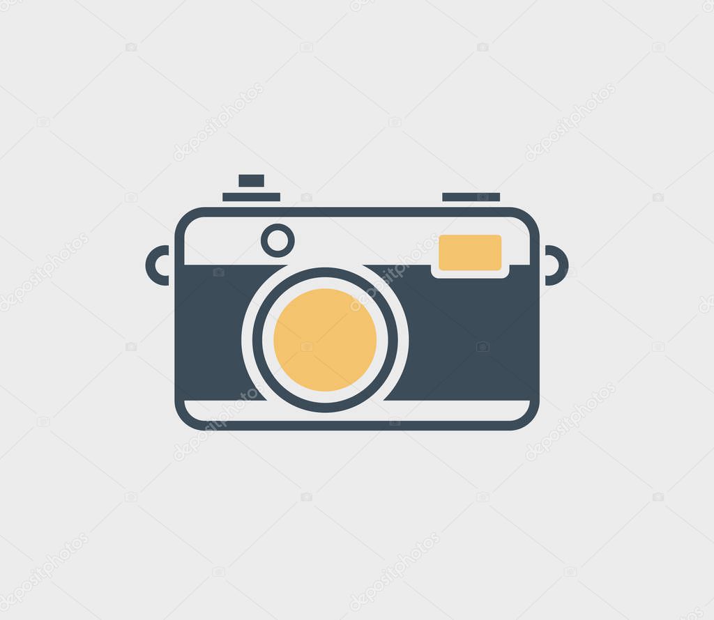 Vintage camera icon isolated on gray background.