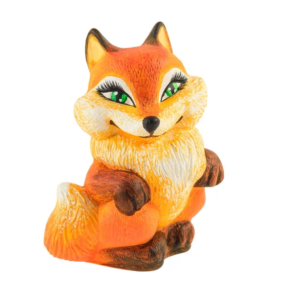 Uma estatueta de barro de uma raposa lindamente colorida — Fotografia de Stock