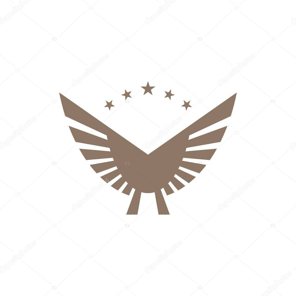 Gold colored wings icon with star shapes