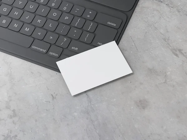 ホワイトビジネスカードコンクリートテーブル 3Dレンダリング上の黒いデジタルタブレットキーボードのモックアップ — ストック写真