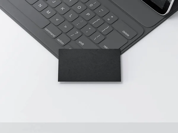 ブラックビジネスカードモックアップデジタルタブレットキーボード上の白いテーブル 3Dレンダリング — ストック写真
