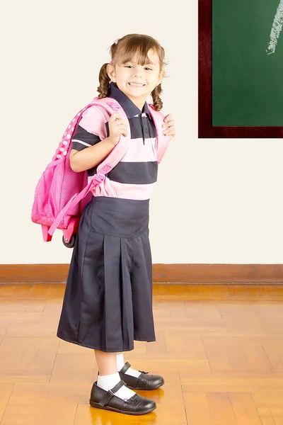 Happy Little School Girl at School Class Room — Stock Photo, Image