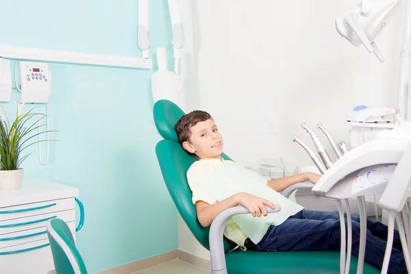 Little kid smiling at dental clinic Royalty Free Stock Images