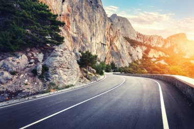 Asphalt road. Colorful landscape with beautiful winding mountain