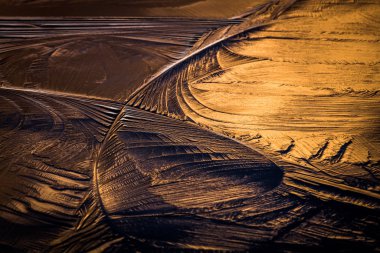 Gün batımında buz çizimi