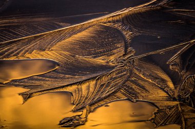 Gün batımında buz çizimi