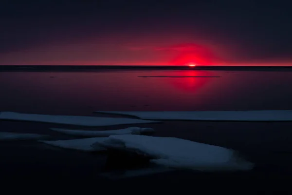 Puesta Sol Sobre Lago Congelado Imagen de stock