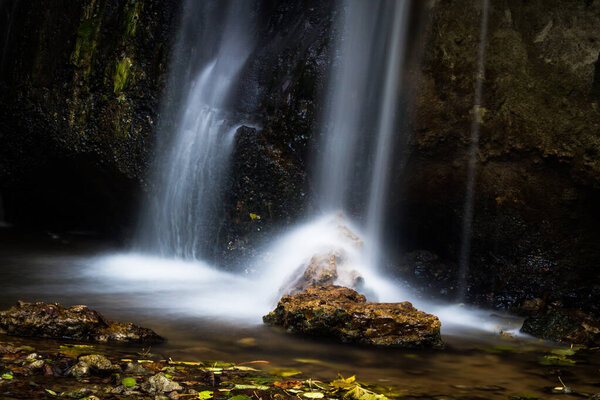 Beautiful waterfall in wild forest