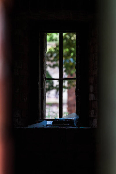 Interior with window in old abandoned building 