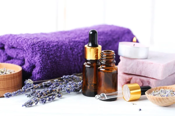 Lavender oil with soap and flowers — Stock Photo, Image