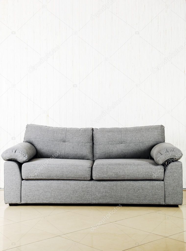Grey sofa on background Stock Photo by ©5seconds 126731372