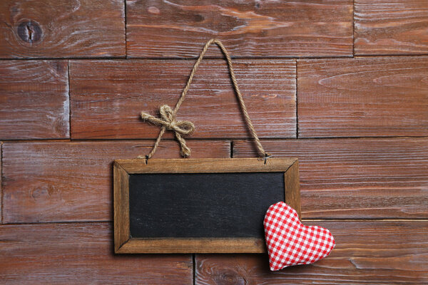 Frame on the wooden background
