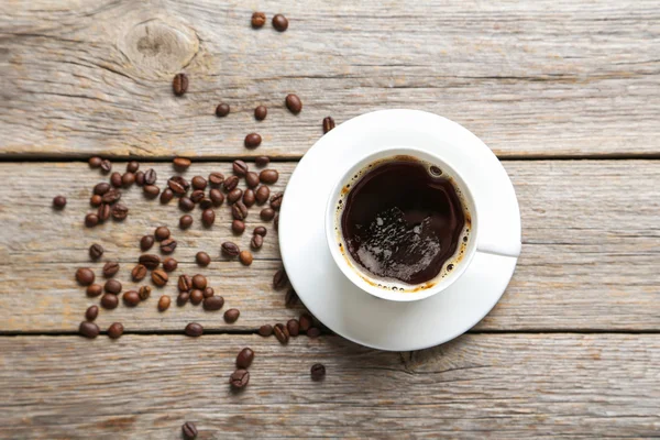 Taza de café en la mesa —  Fotos de Stock