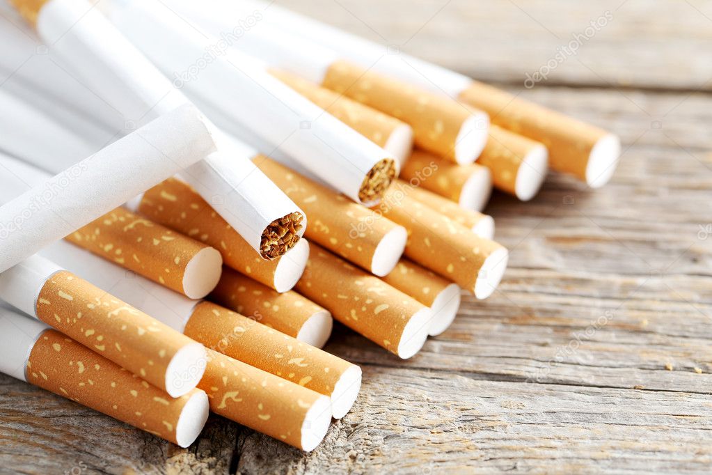 Tobacco cigarettes on table