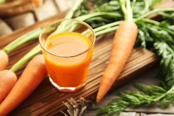 Fresh carrot juice in glass — Stock Photo, Image