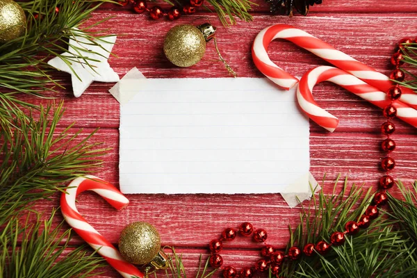 Christmax tree branch with baubles — Stock Photo, Image