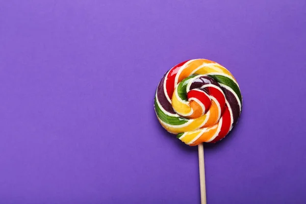 Zoete lollipop op achtergrond — Stockfoto