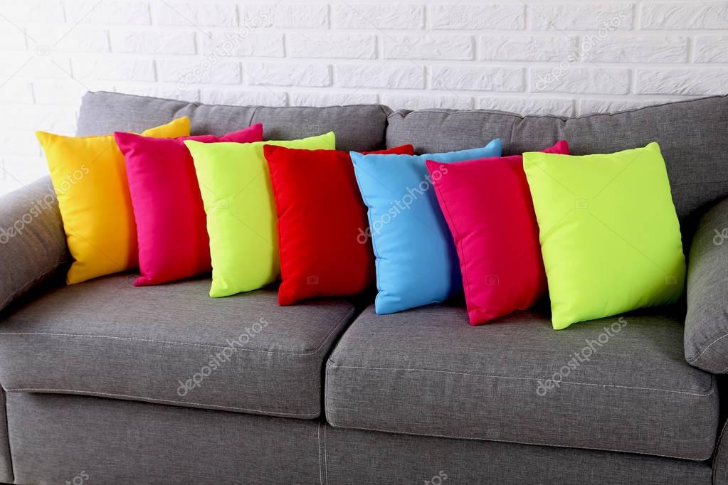Colorful pillows on background — Stock Photo © 5seconds 128903814