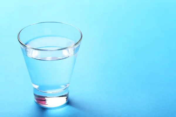 Glass with water on  background — Stock Photo, Image