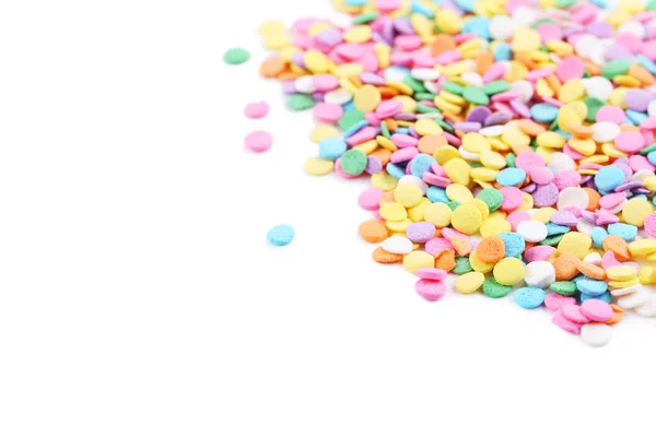 Renkli sprinkles n bir beyaz — Stok fotoğraf