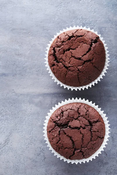 Chocolate muffins on table — Stock Photo, Image