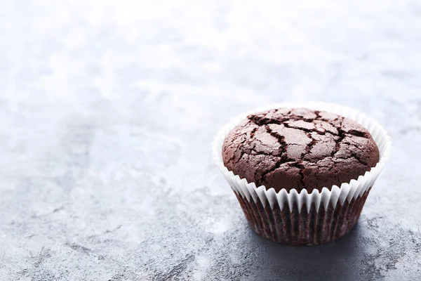 Chocolate muffin on  table — Stock Photo, Image