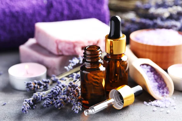 Lavender oil with soap and flowers — Stock Photo, Image