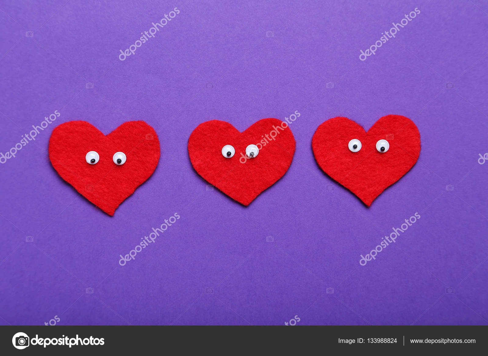 Red hearts with googly eyes — Stock Photo © 5seconds 133988824