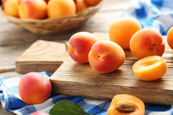 Ripe apricots on table