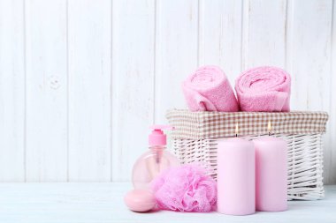 Pink towels with soap and wisp