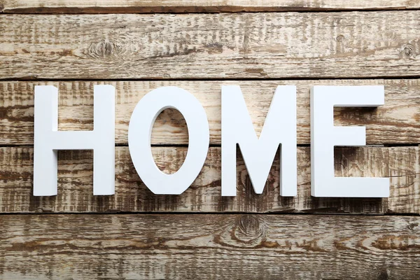 Dřevěné slovo domov — Stock fotografie