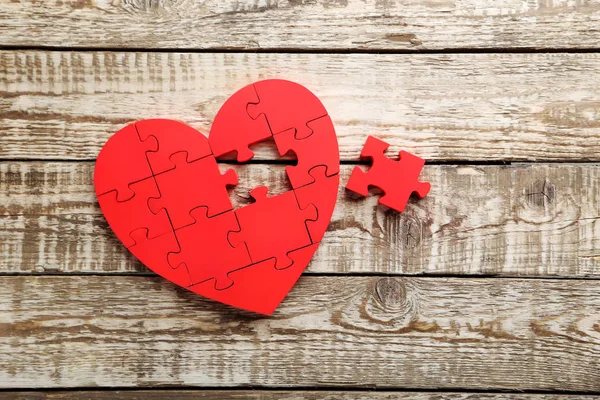 Cuore puzzle rosso Fotografia Stock