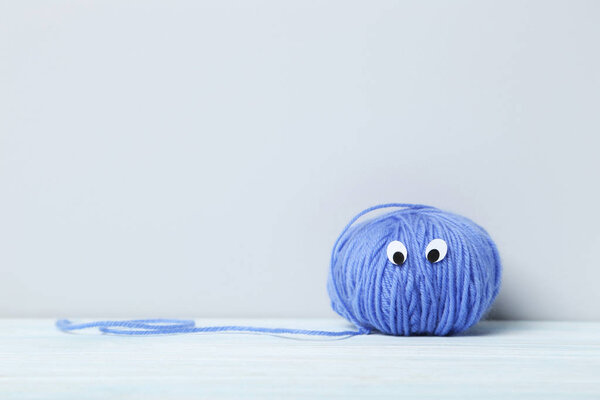 Ball of yarn with eyes