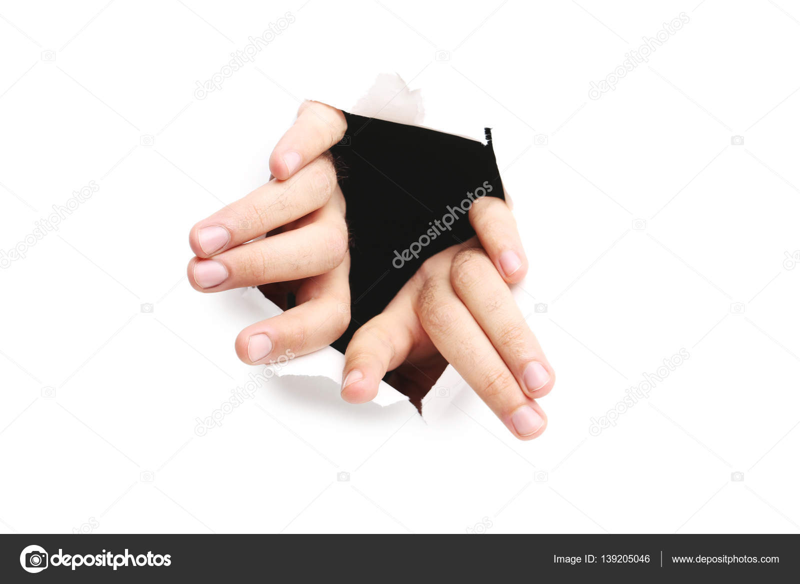 Hands punching through paper Stock Photo by ©5seconds 139205046