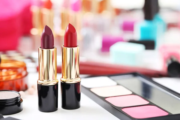 Colourful lipsticks on table — Stock Photo, Image