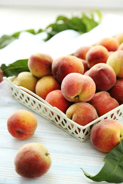 Sweet peach fruit in tray