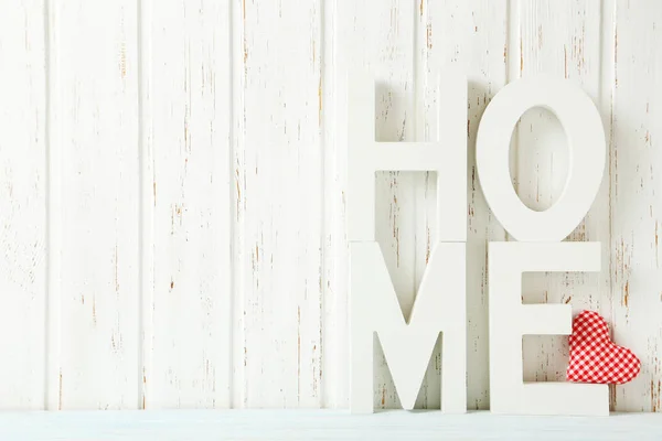 Decorative letters on wooden table — Stock Photo, Image