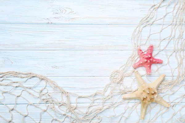 Fishing net with starfish — Stock Photo, Image