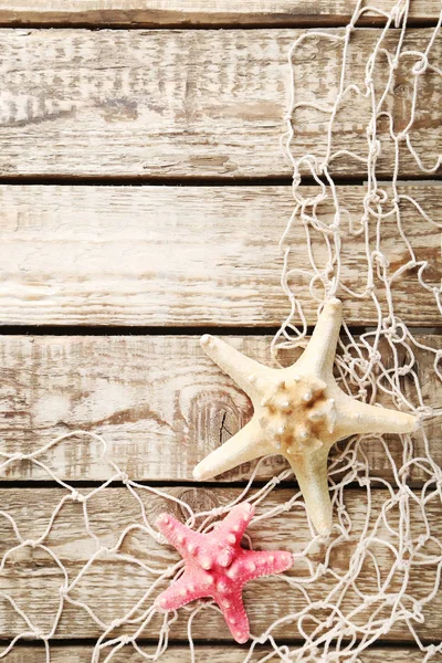 Rede de pesca com estrela do mar — Fotografia de Stock