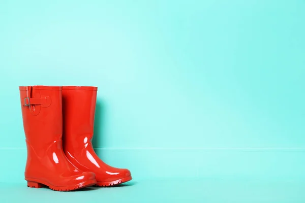 Protective red rubber boots — Stock Photo, Image