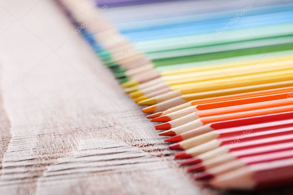 pencils spread out according to colors of rainbow