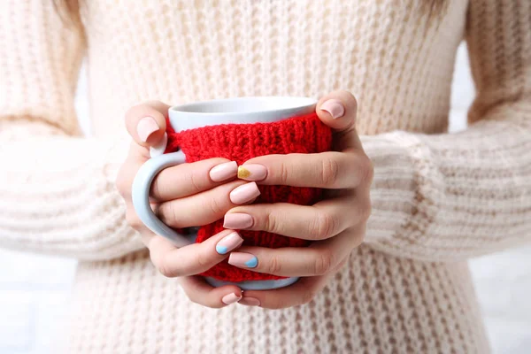 Woman hands holding cup — Stock Photo, Image