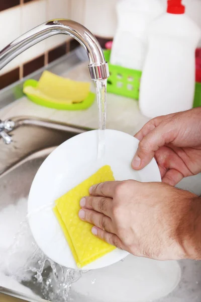 Male hands with sponge — Stock Photo, Image