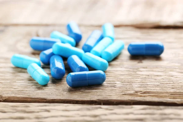 Montón de cápsulas de pastillas azules — Foto de Stock